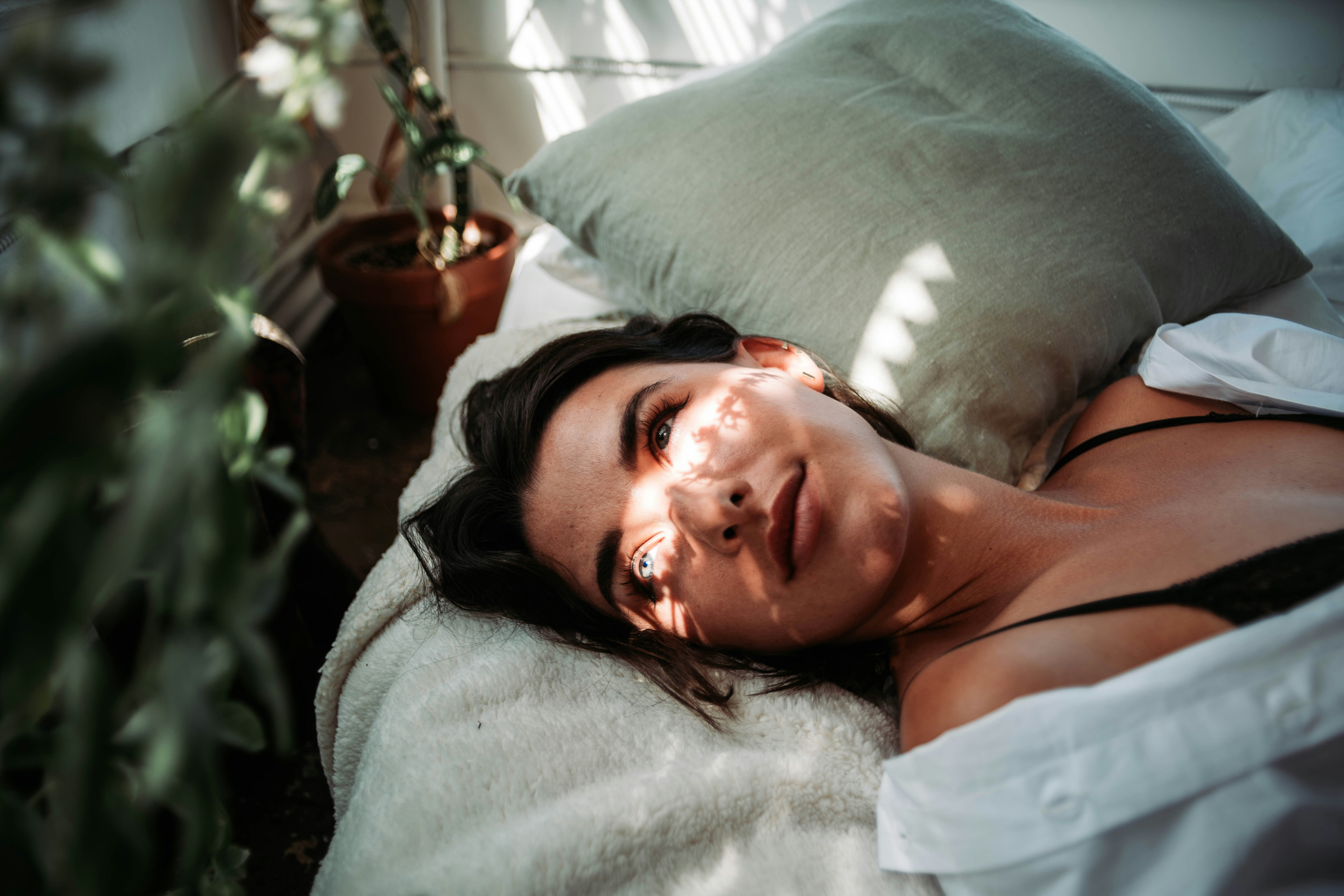 Pre Care person laying in bed inktimate